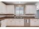 Kitchen featuring stainless steel appliances, granite countertops, and window at 7704 Lots Hills Dr, Las Vegas, NV 89179