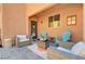 Outdoor patio featuring comfortable seating, ideal for enjoying quiet moments or social gatherings at 7704 Lots Hills Dr, Las Vegas, NV 89179