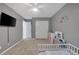 Bright bedroom with a play area, toy storage, and closet space with neutral color palette at 7720 Houston Peak St, Las Vegas, NV 89166