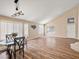 Bright dining space featuring hardwood floors and large windows for natural light at 7924 Mcdowell Dr, Las Vegas, NV 89129