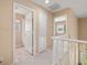 Upstairs hallway with view into an adjacent bathroom at 7924 Mcdowell Dr, Las Vegas, NV 89129