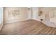 Spacious living room featuring sleek wood flooring and plenty of natural light at 7924 Mcdowell Dr, Las Vegas, NV 89129