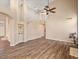 Spacious living room with high ceilings and wood-look flooring at 7924 Mcdowell Dr, Las Vegas, NV 89129
