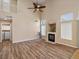 Living room with wood-look flooring and cozy fireplace at 7924 Mcdowell Dr, Las Vegas, NV 89129