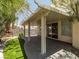 Relaxing covered patio with a concrete floor and well-manicured grass at 7924 Mcdowell Dr, Las Vegas, NV 89129