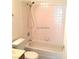 Bathroom featuring a shower with a handheld shower head and tile surround at 8417 Running Deer Ave # 101, Las Vegas, NV 89145