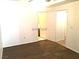 This comfortable bedroom offers an ensuite bath and neutral finishes at 8417 Running Deer Ave # 101, Las Vegas, NV 89145