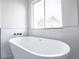 Bathroom with a new soaking tub and modern fixtures at 849 Brahma Ln, Henderson, NV 89002