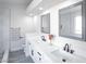 Bathroom boasts dual sinks, modern hardware, and a separate shower and tub at 849 Brahma Ln, Henderson, NV 89002