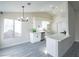 Eat-in kitchen featuring white cabinets, stainless steel appliances, and bright natural light at 849 Brahma Ln, Henderson, NV 89002