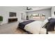 Serene main bedroom with a large window and a calming color palette at 8753 Mann St, Las Vegas, NV 89139