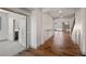Entryway with wood floors leading to a living space and a doorway to a bathroom at 8753 Mann St, Las Vegas, NV 89139