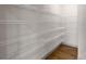 Walk-in pantry featuring multiple shelves for optimal storage at 8753 Mann St, Las Vegas, NV 89139
