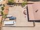 Aerial view showcasing an expansive fenced backyard with RV parking, shed, and covered patio space at 8808 Homestead Rd, Las Vegas, NV 89143