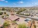 Aerial view of a well-maintained property featuring a spacious backyard, covered patio, and ample parking at 8808 Homestead Rd, Las Vegas, NV 89143