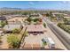 Overhead view of a property with a large backyard, covered patio, mature trees, and convenient access to amenities at 8808 Homestead Rd, Las Vegas, NV 89143