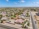 Aerial view highlighting a home with a fenced yard, RV parking, a shed, and a covered patio at 8808 Homestead Rd, Las Vegas, NV 89143