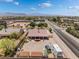 A high angle showcasing a large fenced yard with space for RV parking and a covered patio area at 8808 Homestead Rd, Las Vegas, NV 89143