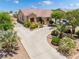 Charming desert home with desert landscaping and a spacious curved driveway at 8808 Homestead Rd, Las Vegas, NV 89143