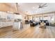 Open concept living area and kitchen with modern floors and many windows and natural light at 8808 Homestead Rd, Las Vegas, NV 89143