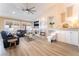 Comfortable living room with a fireplace, large TV, and plenty of seating for Gathering and guests at 8808 Homestead Rd, Las Vegas, NV 89143