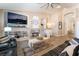 Inviting living room featuring a cozy fireplace, entertainment center, and comfortable seating arrangement at 8808 Homestead Rd, Las Vegas, NV 89143