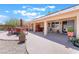 Enjoy outdoor living with this covered patio, outdoor kitchen, dining area, and hot tub for year-round entertainment at 8808 Homestead Rd, Las Vegas, NV 89143
