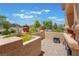 Cozy front porch with stucco planters and a gravel bed at 8808 Homestead Rd, Las Vegas, NV 89143