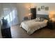 Comfortable bedroom with a plush bed, sliding glass door, and modern furnishings at 9000 Las Vegas Blvd # 1037, Las Vegas, NV 89123