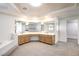 Bathroom boasting a corner soaking tub, double vanity, and plenty of mirrors for added elegance at 902 Cripple Creek Ct, Henderson, NV 89014