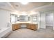 Large bathroom with a dual sink vanity, bathtub, and ample counter space at 902 Cripple Creek Ct, Henderson, NV 89014