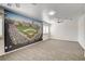 Large bedroom with a ceiling fan, custom mural, and shuttered windows for ample light at 902 Cripple Creek Ct, Henderson, NV 89014