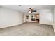 Large carpeted bedroom showcasing a fireplace and French door access to other rooms at 902 Cripple Creek Ct, Henderson, NV 89014
