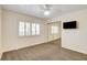 Bright bedroom with a mirrored closet and neutral carpet at 902 Cripple Creek Ct, Henderson, NV 89014