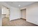 Bonus room with walk in closet, carpet flooring, and bright lighting at 902 Cripple Creek Ct, Henderson, NV 89014