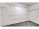 Walk-in closet with ample shelving and rod space for organization at 902 Cripple Creek Ct, Henderson, NV 89014