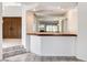 Inviting entryway featuring double doors and a glimpse of the living spaces at 902 Cripple Creek Ct, Henderson, NV 89014