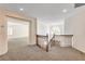 Second floor landing with railing and open doorway, offering easy access to other rooms at 902 Cripple Creek Ct, Henderson, NV 89014