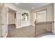 Upstairs loft area with natural light and view of other rooms at 902 Cripple Creek Ct, Henderson, NV 89014