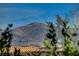 Stunning mountain views behind the house showcasing a natural landscape at 902 Cripple Creek Ct, Henderson, NV 89014