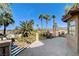 Outdoor patio features railing, palm trees, and views of city and mountains beyond at 902 Cripple Creek Ct, Henderson, NV 89014
