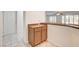 Convenient wet bar with a sink and cabinet storage, perfect for entertaining guests at 902 Cripple Creek Ct, Henderson, NV 89014