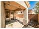 Covered backyard patio area provides an ideal spot for relaxing in the shade at 9122 Mountain Maple Ct, Las Vegas, NV 89148
