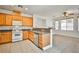 Traditional-style kitchen featuring tile flooring, wooden cabinetry and stainless steel appliances at 9122 Mountain Maple Ct, Las Vegas, NV 89148