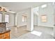 Spacious, open living area featuring tile flooring, large windows, and neutral paint at 9122 Mountain Maple Ct, Las Vegas, NV 89148