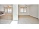 Open living area with tile floors, fireplace, and neutral walls at 9122 Mountain Maple Ct, Las Vegas, NV 89148