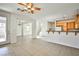 Bright, open-concept living area with tile flooring, neutral walls, and natural light at 9122 Mountain Maple Ct, Las Vegas, NV 89148
