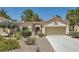 Charming single-story home with desert landscaping and a two-car garage at 9516 City Hill Ct, Las Vegas, NV 89134