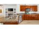 Close-up view of a kitchen featuring granite countertops and stainless steel appliances at 10463 Pioneer Park Ave, Las Vegas, NV 89135