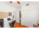 Office with built-in cabinets, a laptop, a rolling chair and a closet at 10463 Pioneer Park Ave, Las Vegas, NV 89135